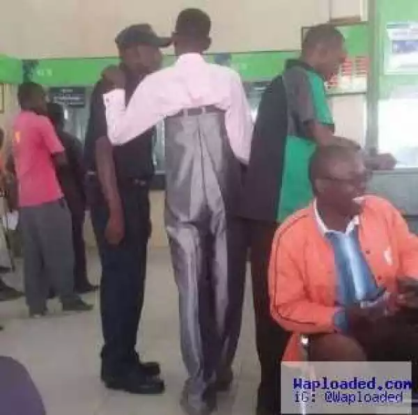 Photo: Man Wearing Extremely Baggy Trouser Cracked Up Bank Customers